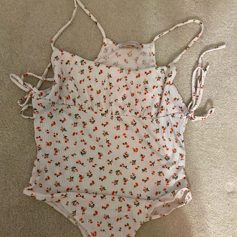Endless Blues Boutique floral bodysuit in white with red flowers